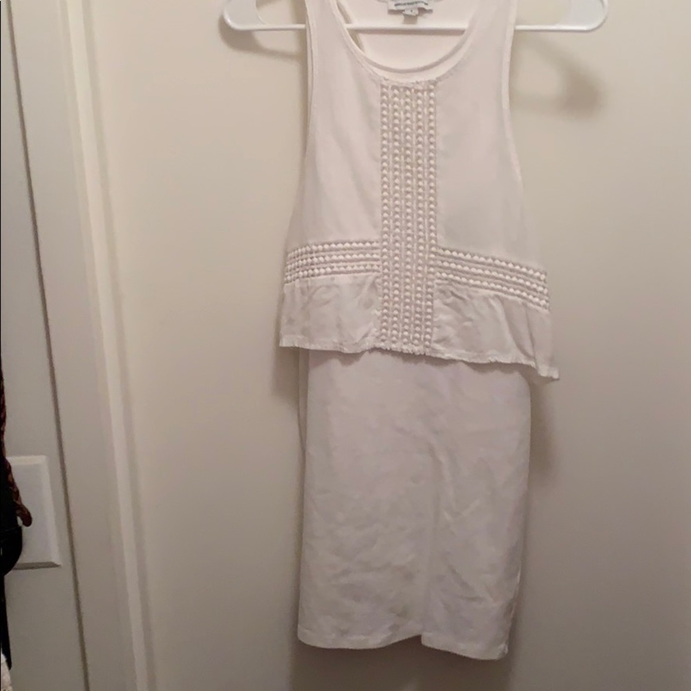 White tight mini dress, thick straps, flowy top